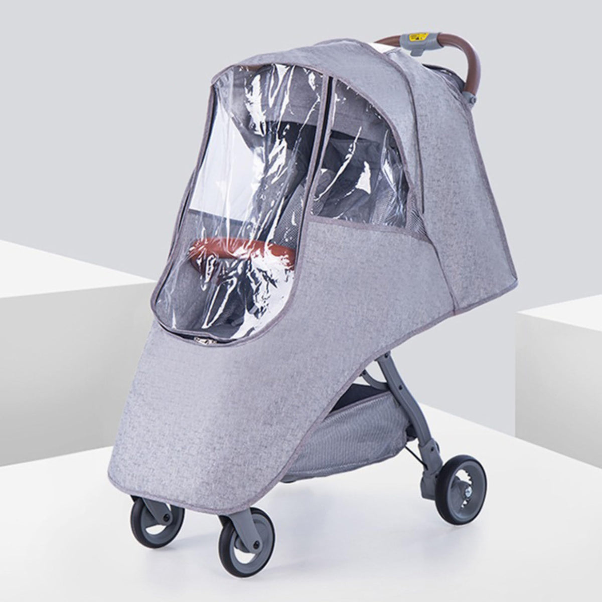 Kinderwagen-Regenschutz mit Reißverschluss - Einheitsgröße schützt vor Nässe, mit klarem Sichtfenster und einfacher Handhabung fürs Kinderwagenverdeck.