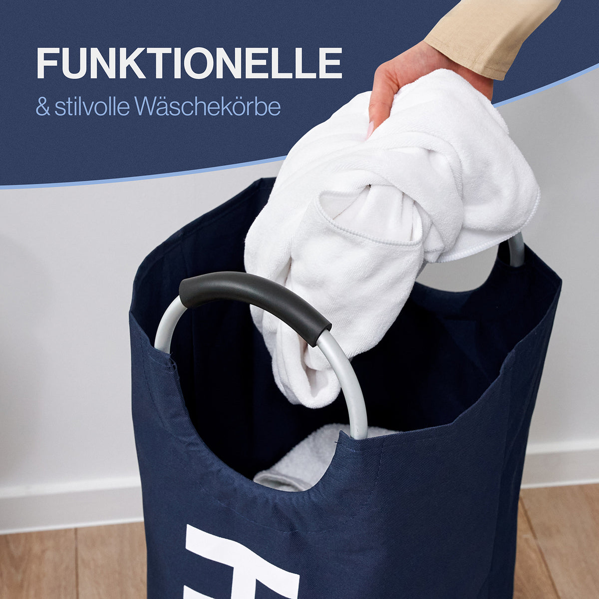 Faltbarer Wäschekorb - Dunkelblau aus wasserabweisendem Polyester mit robusten Henkeln, ideal zum platzsparenden Verstauen und Transportieren.