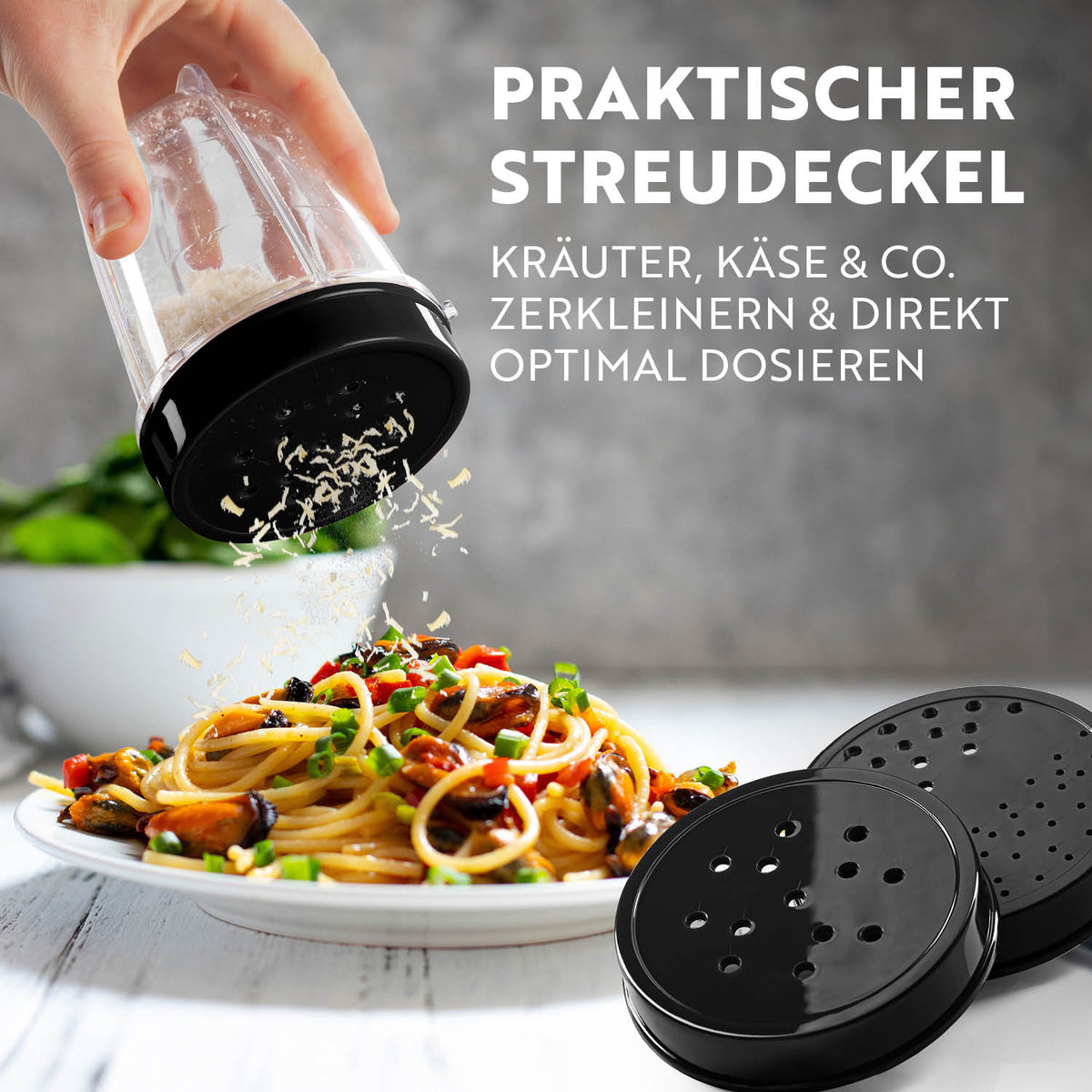 Mr. Magic Smaragdgrün/Schwarz praktischer Streudeckel zum Dosieren von Kräutern und Käse auf Pasta.