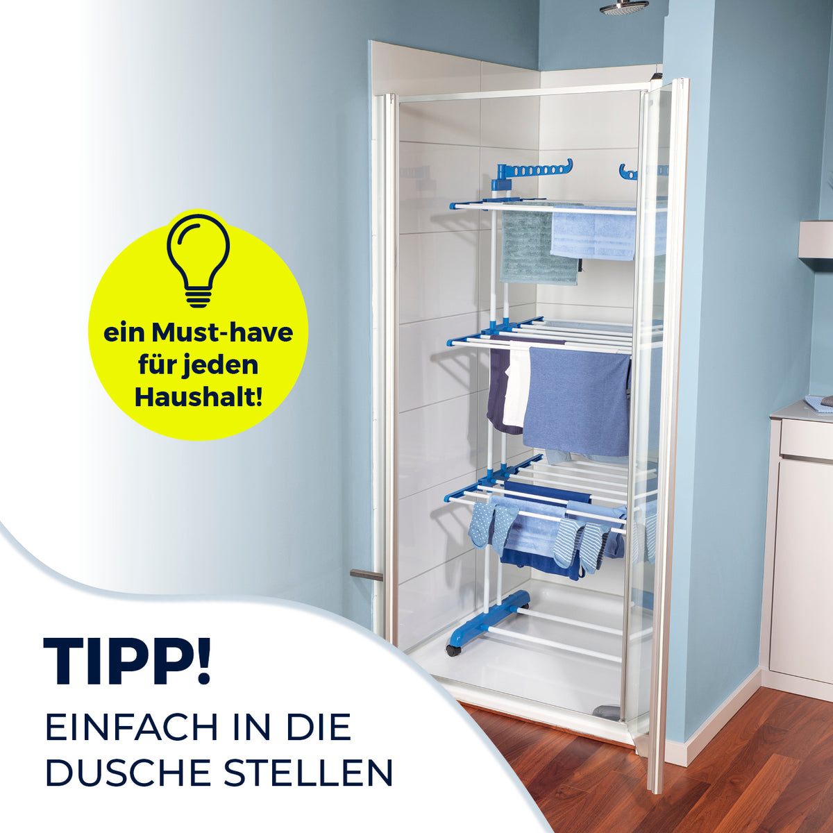 Wäsche-Tower 1600 platzsparend in der Dusche aufgestellt, zum stromlosen Trocknen mit 3 Ebenen und 14 Bügeln für Hemden und Handtücher.