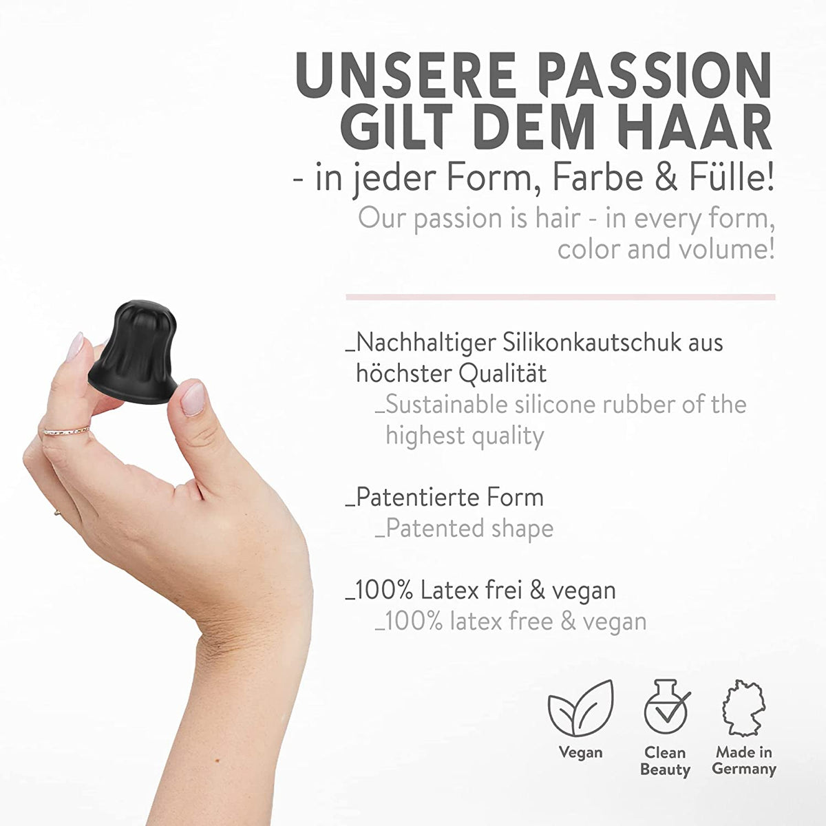Hand hält schwarzes Pony-Produkt aus nachhaltigem Silikonkautschuk in patentierter Form, vegan und latexfrei.