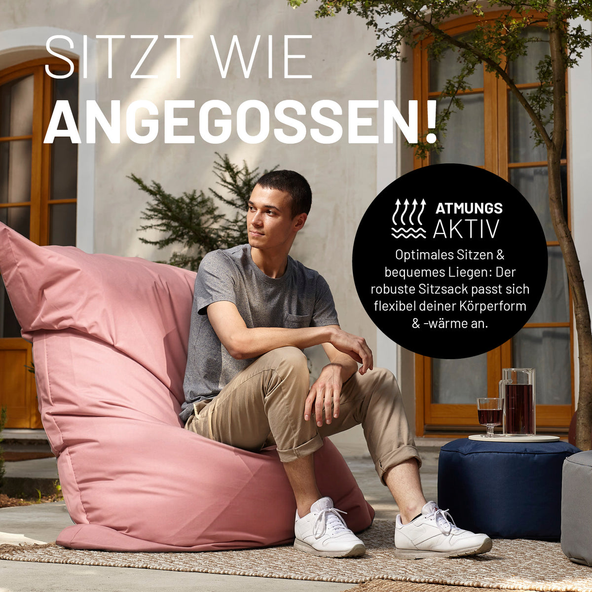 Mann sitzt komfortabel auf Sitzsack Classic XXL (380 L) - indoor & outdoor - Pastell Pink mit atmungsaktivem Material und flexiblem Sitzkomfort im Außenbereich.