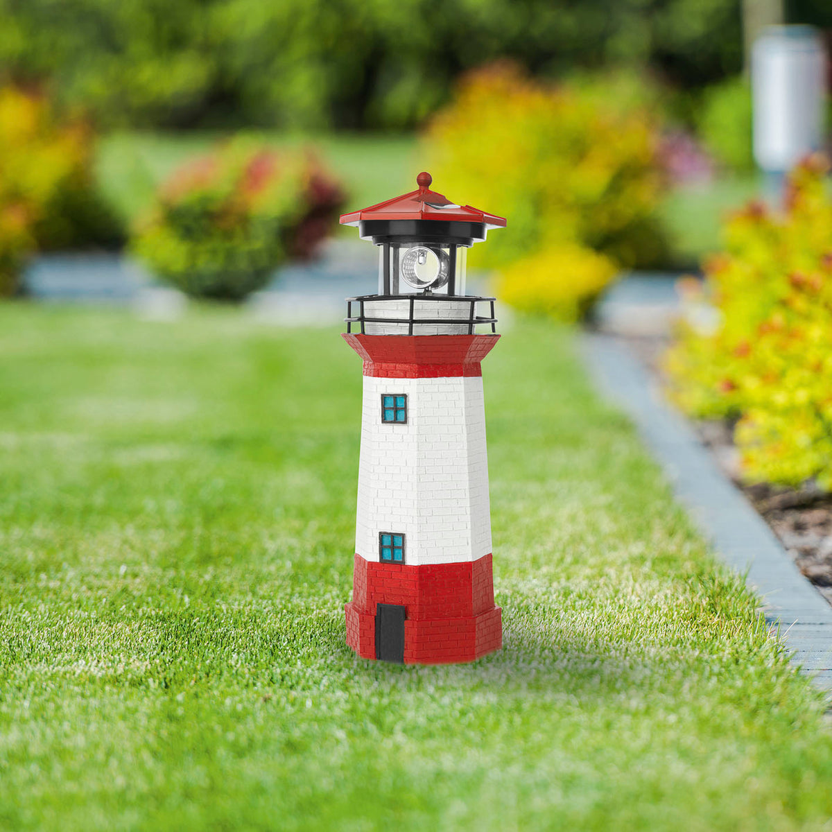 Solar-Leuchte Leuchtturm - Rot/Weiß mit dekorativem Leuchtfeuer und wetterbeständigem Design für stimmungsvolle Gartenbeleuchtung.