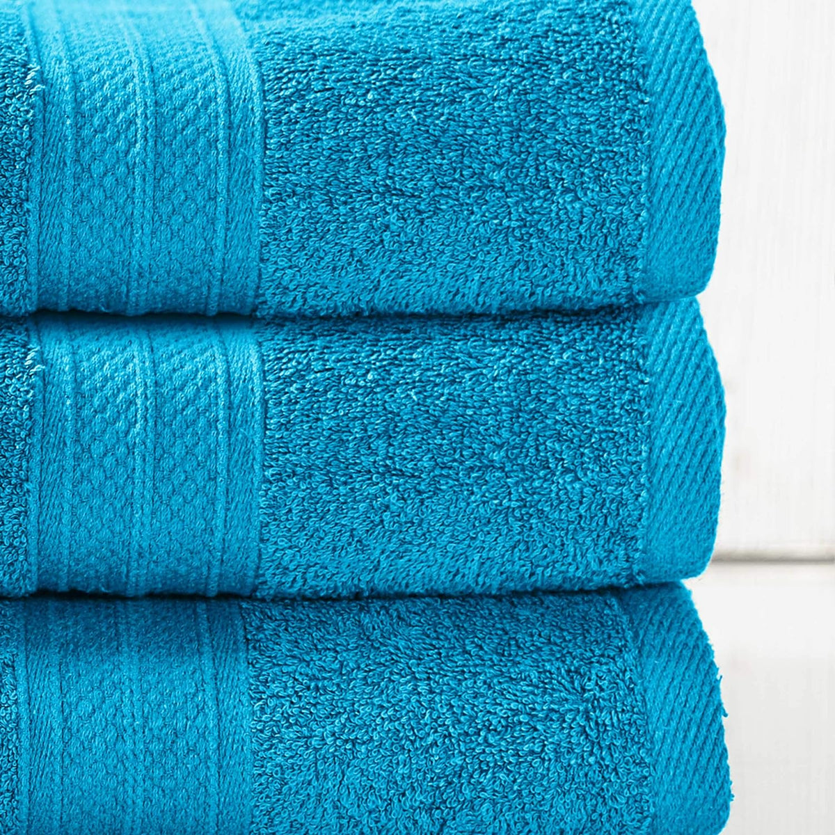 Premium Handtuch-Set - 2 Handtücher (50 x 100 cm) + 2 Badetücher (70 x 140 cm) in Türkis, weich und saugfähig aus 100 % Baumwolle.