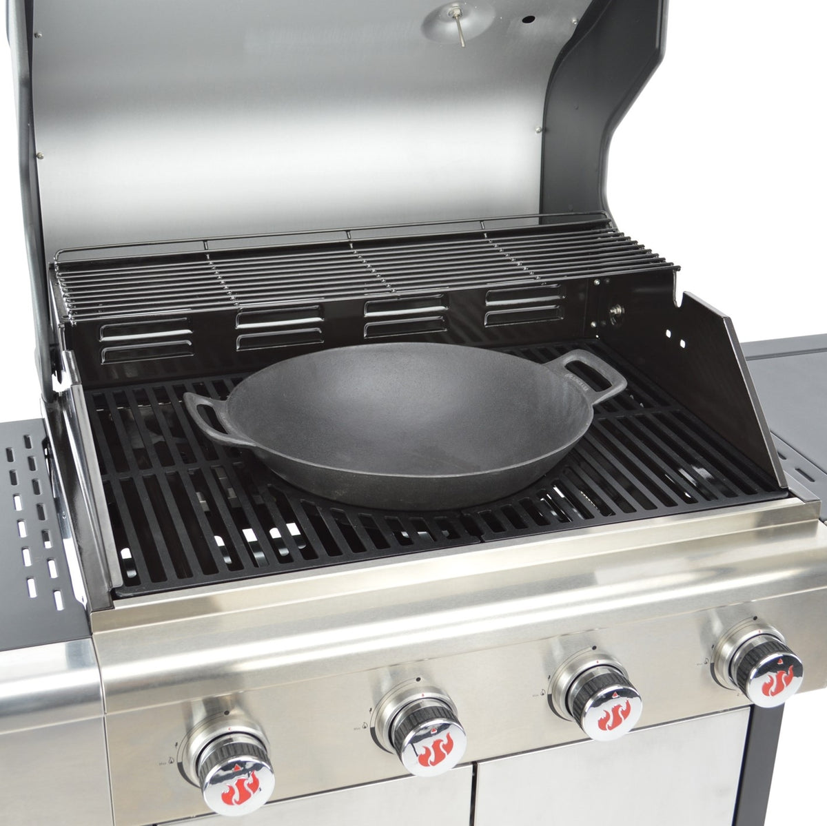 Modulus Grillrostsystem Triton 3.1/4.1 aus emailliertem Gusseisen im Grill mit Wok-Einsatz und modularen Elementen.